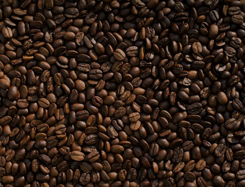 Roasted coffee beans filling the frame